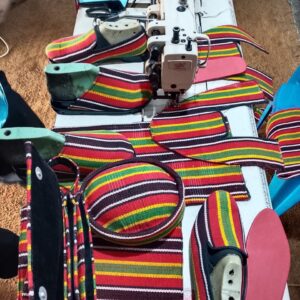 Esan attire to designs shoes,caps,bags